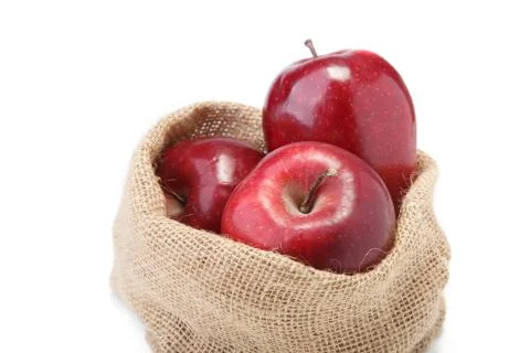 Apples in sacks isolated on white Stock Photos