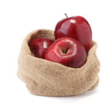 Apples in sacks isolated on white Foto stock