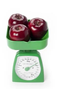 Apples on a scale Stock Photos