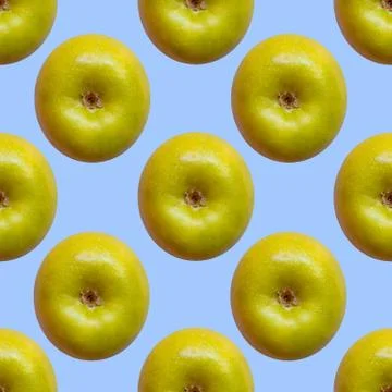 Apples seamless texture on the blue background. Stock Photos