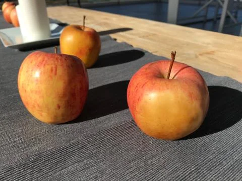 Apples on the table_3 Stock Photos