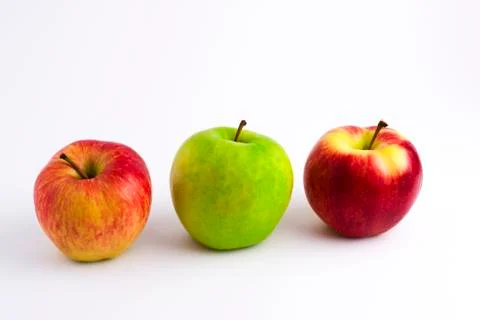 The apples on a white background. A group of apples green and red on a white Stock Photos
