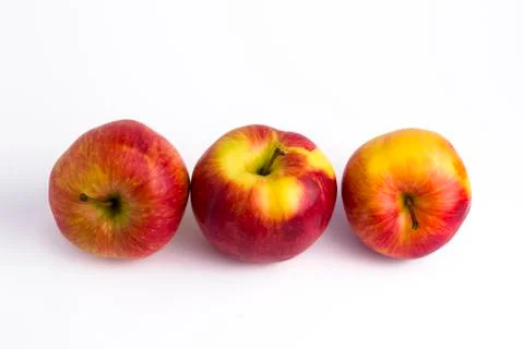 Apples on a white background. A group of apples on an isolated white backgrou Stock Photos