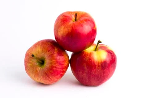 Apples on a white background. A group of apples on an isolated white backgrou Stock Photos