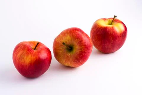 Apples on a white background. A group of apples on an isolated white backgrou Stock Photos