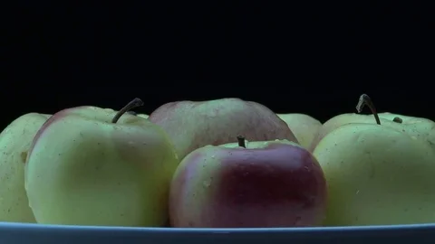 Apples on white plate Video stock 83807172