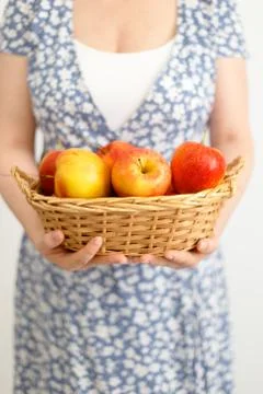 Apples in woman's hands Stock Photos