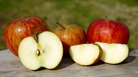 Apples on wooden table Stock Footage 41921296