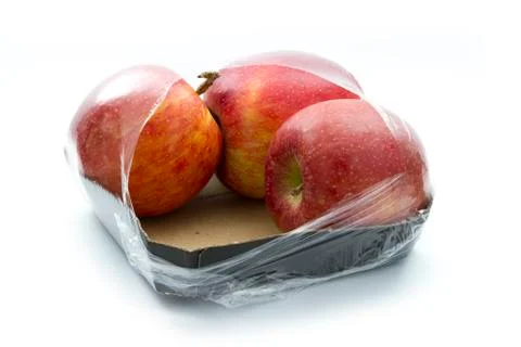 Apples in wrapping Stock Photos
