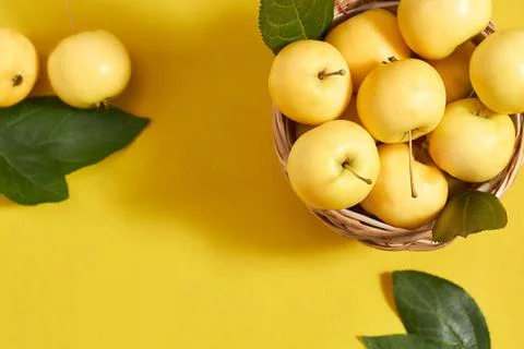 Apples on a yellow background vitamins, proper nutrition, vegetarianism. Stock Photos