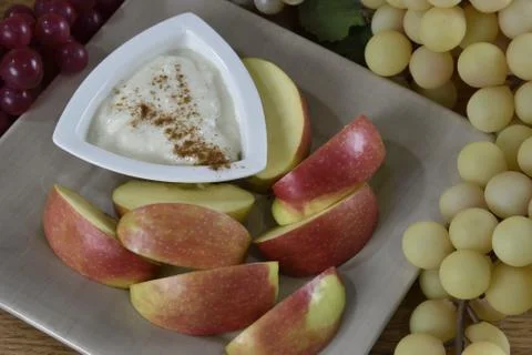 Apples with yogurt Stock Photos