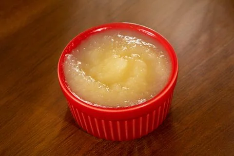 Applesauce in Red Ramekin Foto stock