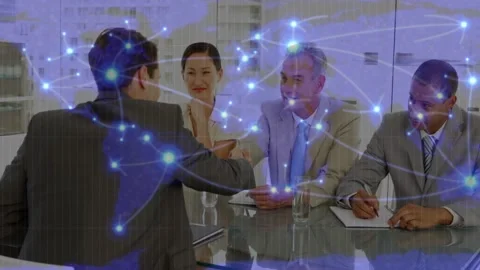 Applicant speaking to panel at glass table, shaking hands as network nodes Stock Footage 333900351