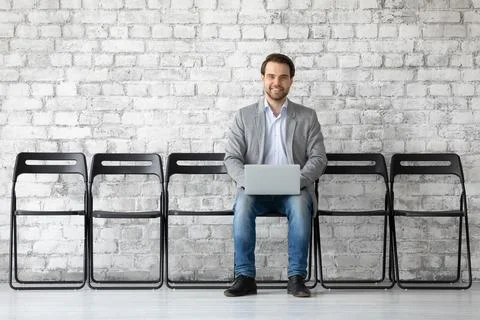 Applicant using laptop, searching vacancy on internet Stock Photos