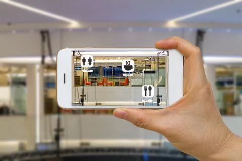 Application of Augmented Reality or AR for Navigation Concept in Mall Looki.. Stock Photos