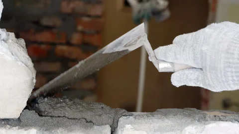 Application of cement mortar on the bricks. Stock Footage 242191932