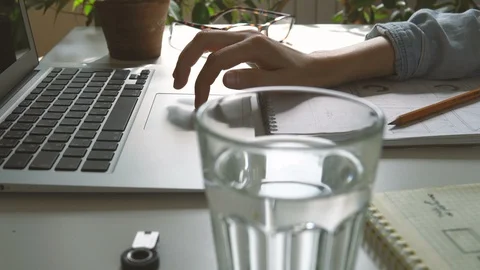 The application developer draws sketches in a notebook. Works remotely from home Video stock 88173176