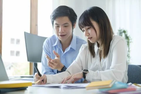 Application developer team working on design project for mobile application.. Stock Photos