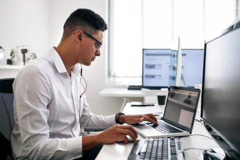 Application developer working on computer in office Stock Photos