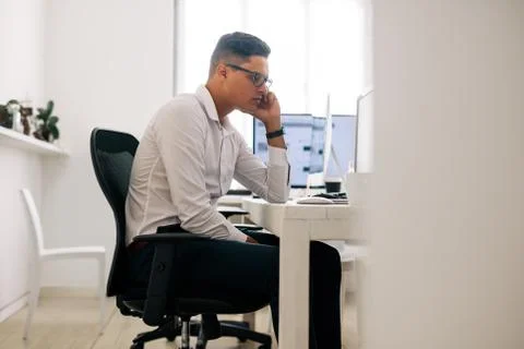 Application developer working on computer in office Stock Photos