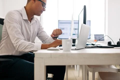 Application developer working on computer in office 写真素材
