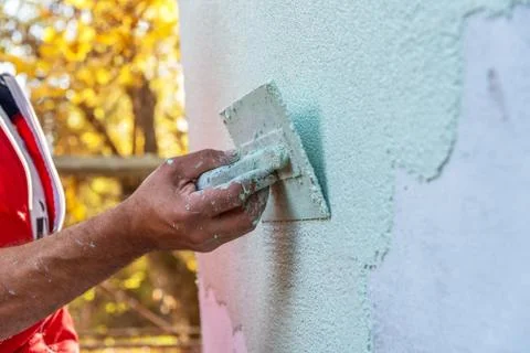 Application Of Facade Plaster. Stock Photos