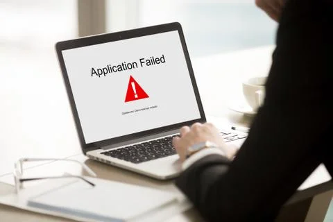 Application failed, businessman having problem with laptop, soft 库存照片