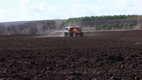 Application of fertilizers before sowing. Stock Footage 193545158