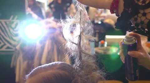 Application of hairspray to create a hairstyle 스톡 동영상 44726206
