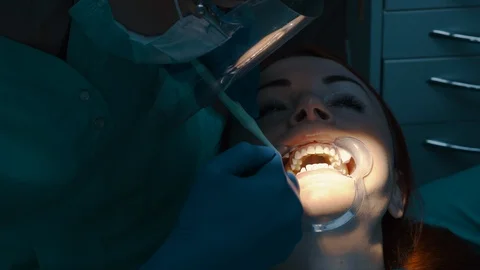 Application of insulating gel to gum, close up. Video stock 104785209