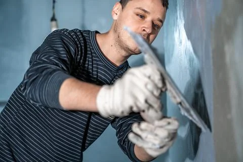 Application of insulation to the wall against moisture and water Stock Photos