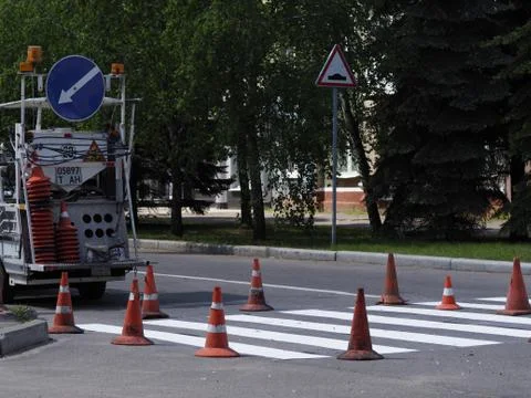 The application of new markings on the pavement Stock Photos