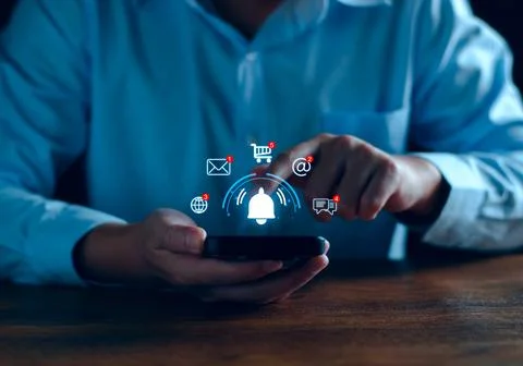 Application notification alert concept. Business people using smartphone with Stock Photos