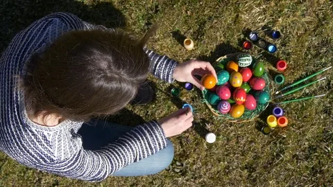 Application of paint on the Easter eggs Stock Footage 83549688