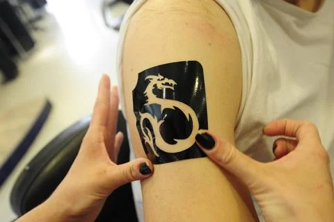  the application of a temporary or removable tattoo, fashion and lifestyle... 写真素材