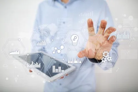 Applications icons and graphs on virtual screen. Business, internet and Fotos Stock