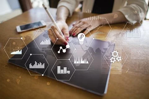 Applications icons and graphs on virtual screen. Business, internet and Fotos Stock