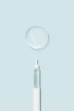 Applicator for GLP-1 Therapy on Blue Background Stock Photos