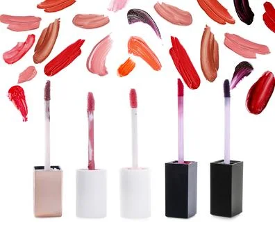 Applicators and lip gloss samples isolated on white Stock Photos