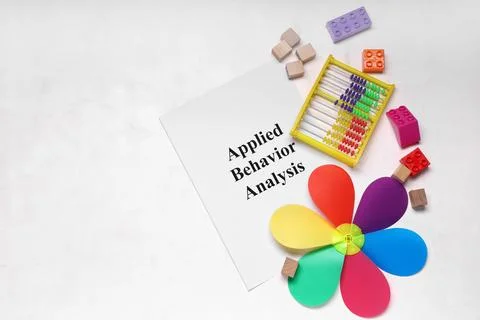 Applied behavior analysis with educational toys, abacus, and colorful pinwhee Stock Photos