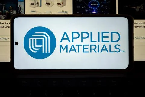 Applied materials logo on mobile communication device Stock Photos