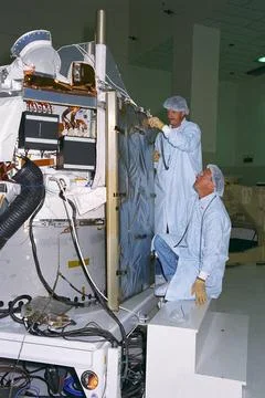 Applied Physics Laboratory Engineer Cliff Willey (kneeling) and Engineerin... Stock Photos