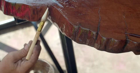 Apply a lacquer to coat the wood for durability and shine. Stock Footage 292424343