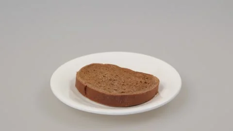 Apply mayonnaise on bread close up Stock Footage 117444498