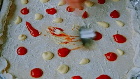 Apply the sauce on the pizza dough. Stock Footage 73373612