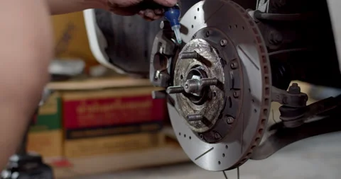 Apply threadlocker prevents nut not let it fall off.Threadlocker prevents nut. Stock Footage 259838716