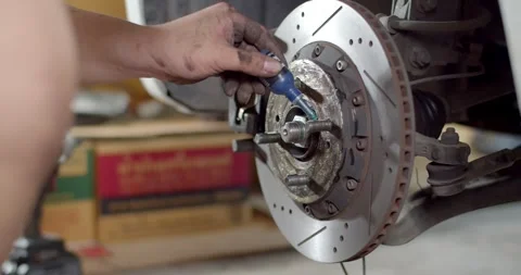 Apply threadlocker prevents nut not let it fall off.Threadlocker prevents nut. Stock Footage 263334123