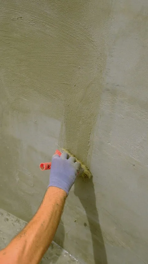 Apply waterproofing to the walls. Selective focus. Stock Footage 317253863
