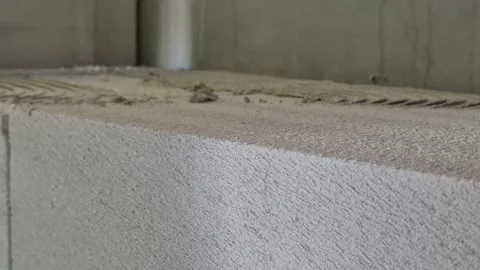 Applying and Preparing Mortar on Aerated Concrete Block Wall Stock Footage 336267038