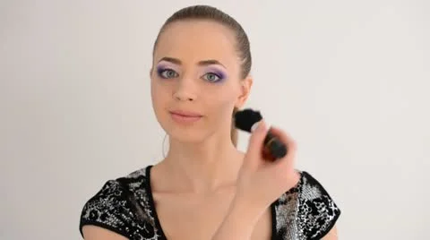 Applying blusher Stock Footage 20465492